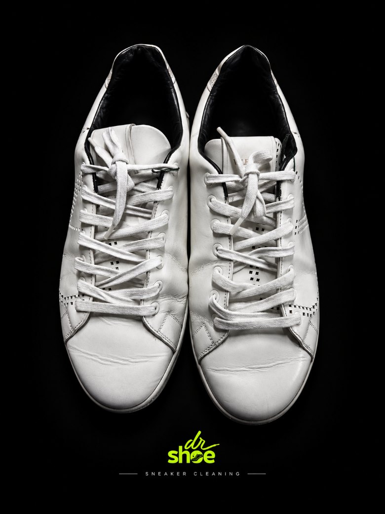 The same Valentino sneakers cleaned back to bright white