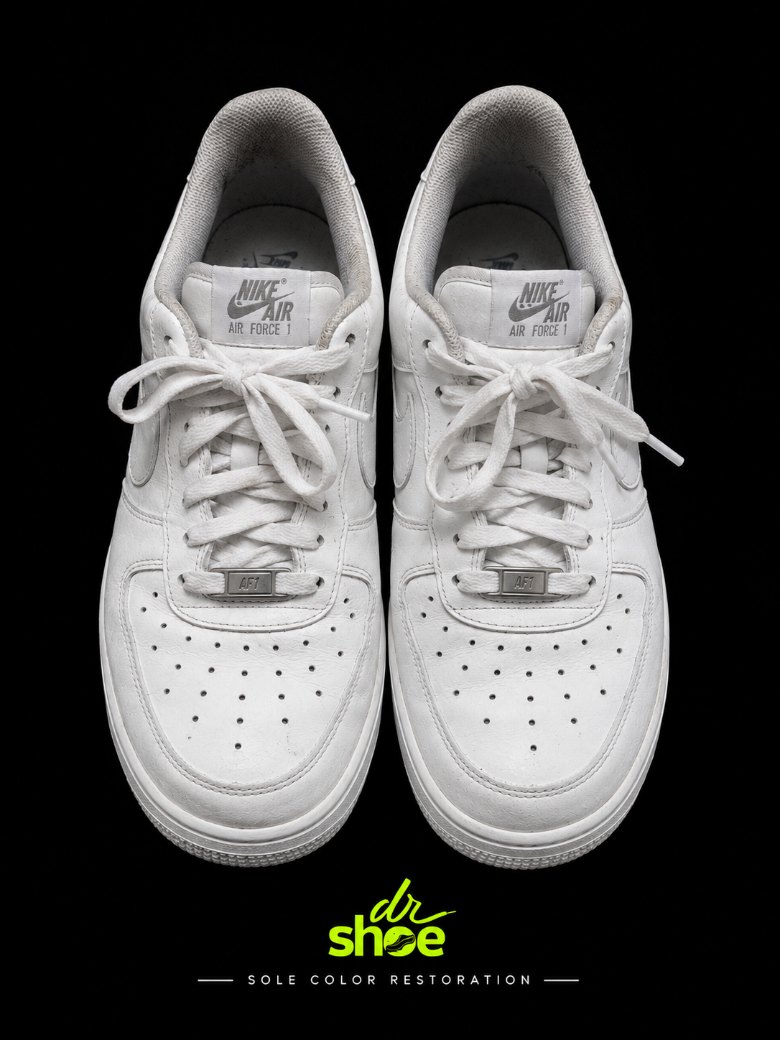 The same Air Force 1 with the midsoles restored to white
