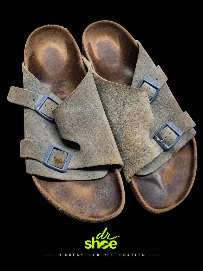 Birkenstock sandals with faded, patchy suede straps